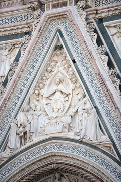 Foederis Arca. The Virgin Protector at central Portal Tympanum of Duomo Santa Maria del Fiore, Florence, Italy