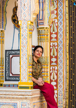 lady posing at colorful museum of Rajasthan