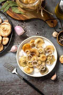Marinated mushroom salad with onion and olive oil