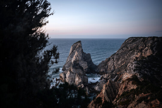 Rugged sea stack at Cabo da Roca above Atlantic Ocean