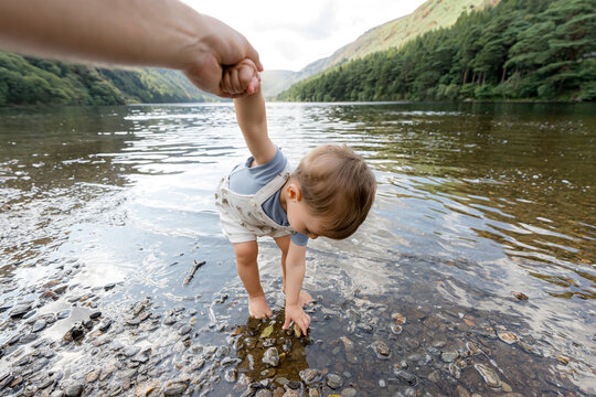 Toddler explore Upper Lake in Glendalough, Ireland