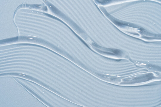 Translucent cosmetic gel texture with soft blue tones