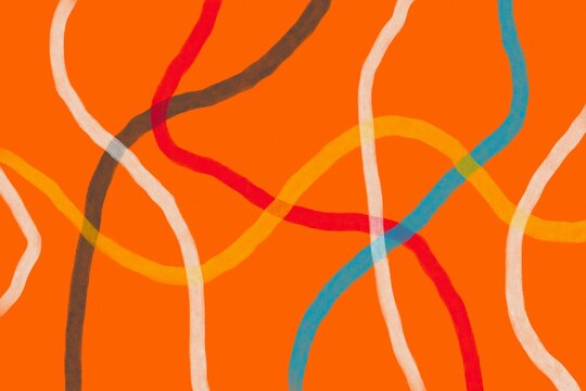 Abstract colorful wavy line pattern on orange background