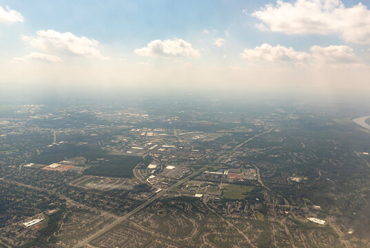 Travel and History: High Altitude Aerial View of Northern Virginia Suburbs and Potomac River on Approach to Washington Dulles Airport