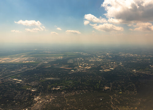 Travel and History: High Altitude Aerial View of Northern Virginia Suburbs and Potomac River on Approach to Washington Dulles Airport
