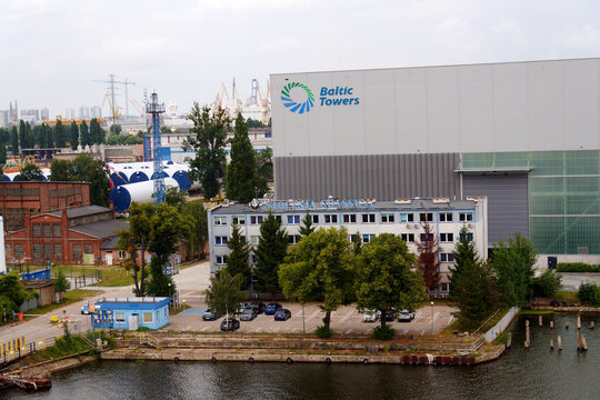 Baltic Towers company logo displayed on the rooftop of a factory, industrial manufacturer of steel towers for offshore wind turbines on July 22, 2026 in Gdansk, Poland.
