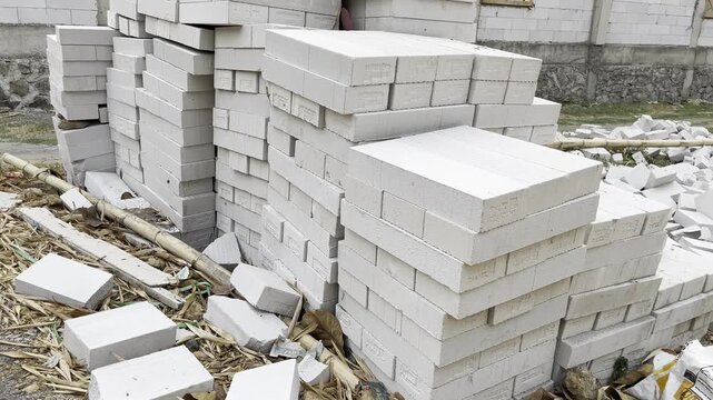 Stack of lightweight concrete blocks at a construction site