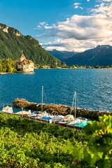 Fototapeta premium Vineyards and Chillon Castle on Lake Geneva in Switzerland on September 1, 2020.