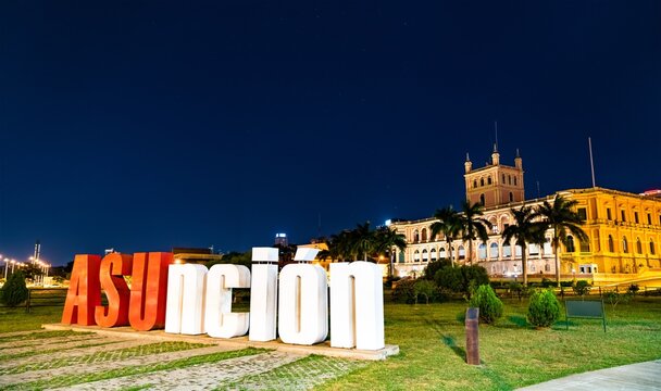 The welcome sign and Palace of the Lopez in Asuncion, Paraguay on February 5, 2020.
