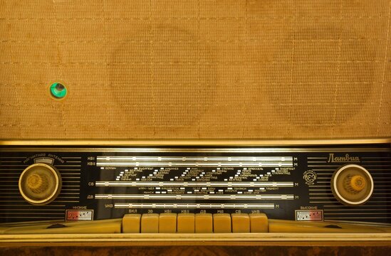 Front panel, tuning scale, and controls of a vintage Soviet Latvija radiogram manufactured by VEF.