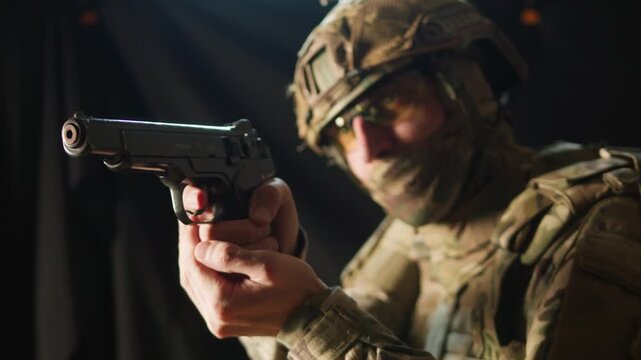 Portrait of modern soldier in military uniform and a helmet with headphones rifle, army warrior Warrior Military Gear Ready for Battle, airsoft Players in Tactical Gear and Riot Police Training
