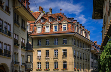 Obraz premium Historic sandstone townhouses with tiled terracotta roofs in Bern, Switzerland