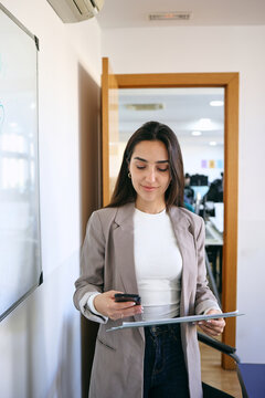 young latin businesswoman working at office in Latin America, hispanic female at workplace