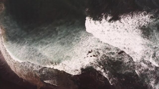 Drone shot, from above, surf at the beach of Praia dos Mosteiros, Mosteiros, Sao Miguel Island, Azores, Atlantic Ocean, Portugal