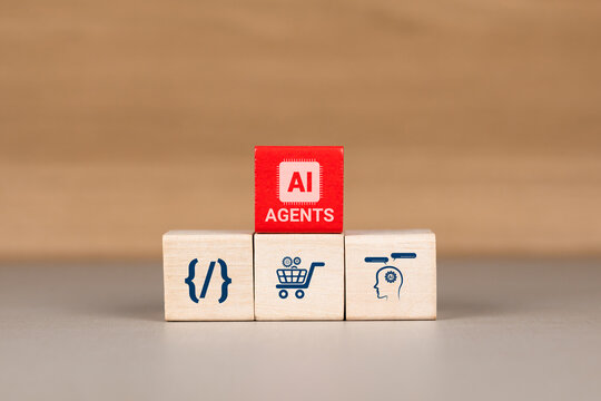 Stacked wooden blocks featuring technology and business icons. Concept of AI agents, automation of repetitive tasks, and business innovation.