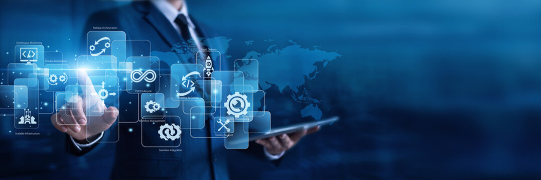System engineer using futuristic digital network interface with global DevOps deployment automation tools. Managing continuous integration and software release. Agile enterprise IT infrastructure.