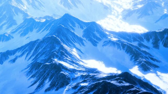 Snow covered mountain peaks rise dramatically against a clear blue sky. The sun highlights the contours of the majestic landscape, creating a peaceful winter scene.