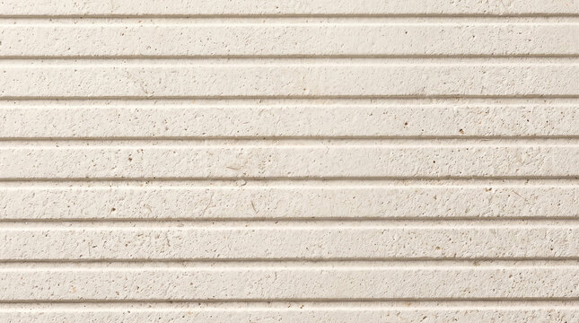 Horizontal parallel grooves carved in textured light stone surface