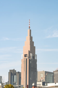 NTT Docomo Yoyogi Building skyscraper against clear blue sky in Tokyo, Japan