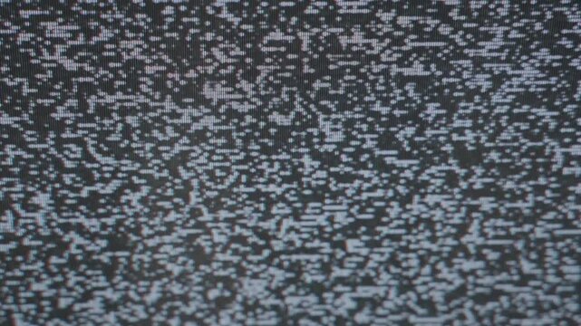 Analog television static with flickering noise and grain texture