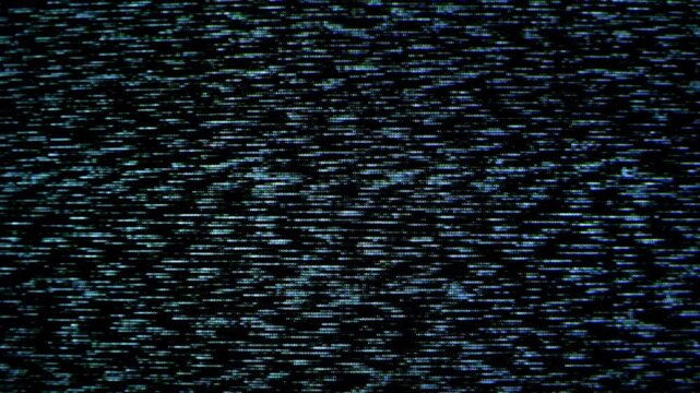 Dense analog static and digital noise cascading through darkness