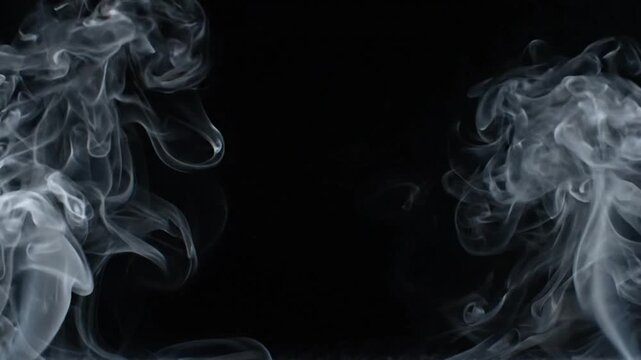 Flowing white smoke rising on both sides against a dark black background creating mysterious atmosphere