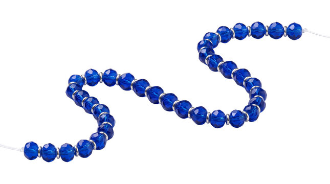 Cobalt blue glass bead necklace, elegant sapphire jewelry strand with silver spacers, handcrafted fashion accessory for luxury styling isolated PNG with Transparent Background