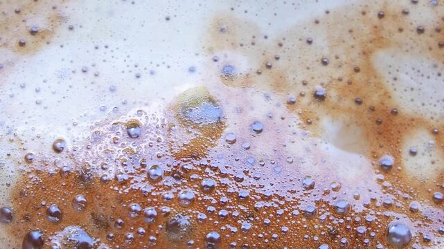 abstract coffee and milk foam swirl texture background
