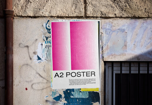 Mockup Of Customizable A2 Poster On Rome Street Wall