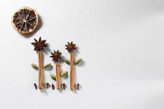 Mulled wine preparation with spice arrangement showcasing natural textures