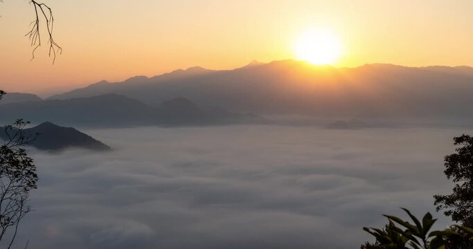 Sunrise over a sea of clouds in the mountains of Zhejiang, China, golden hour landscape