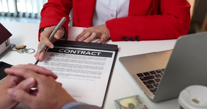Real estate sales consultation between a property agent and a potential buyer, focusing on house selection, contract negotiation and financial planning to support informed homeownership decisions.