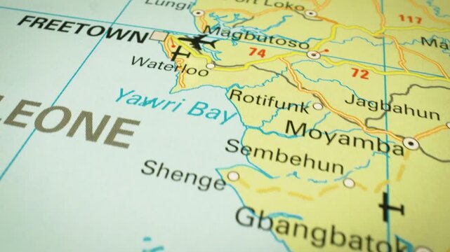 Sierra Leone &ndash; flyover across the country toward Freetown on a printed map