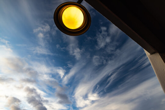 graphic image of front door overhead lamp at sunrise