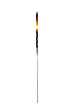 Single bright burning sparkler with glowing embers and a long metal stick on a clean white background