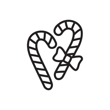 Line icon of two crossed striped candy canes tied with a ribbon bow.