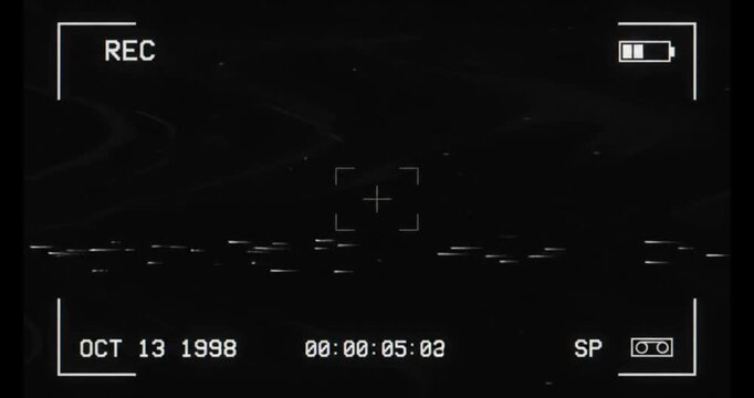 Grainy camcorder interface overlay with recording indicator and timestamp for retro video effects