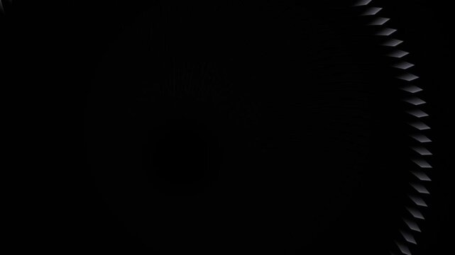 Abstract circular motion featuring rotating metallic fan blades creating smooth hypnotic visual loop on dark black background.