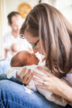 Mother and newborn bonding and connecting nose to nose