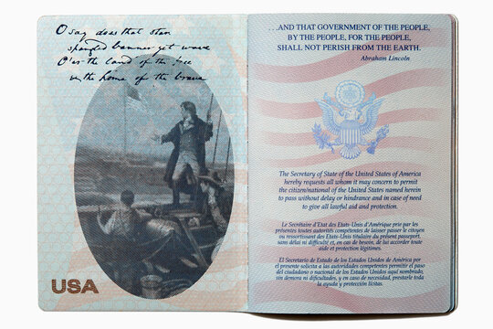 Open US passport on white background