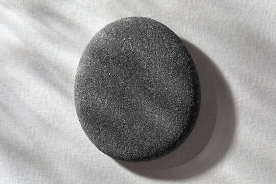 Stone on white textured background