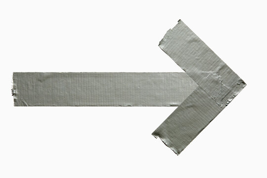 Duct tape in shape of arrow on white background