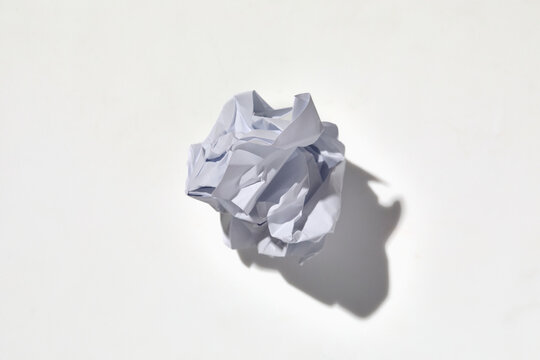 Crumpled piece of paper on white background