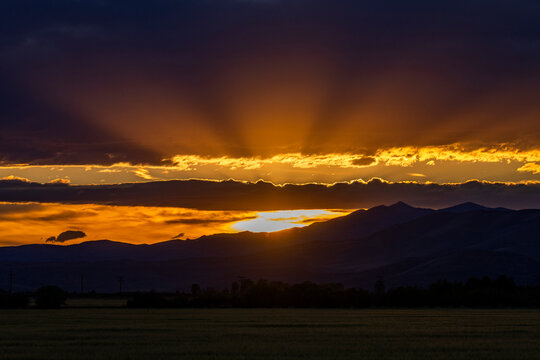 God rays over landscape at sunset