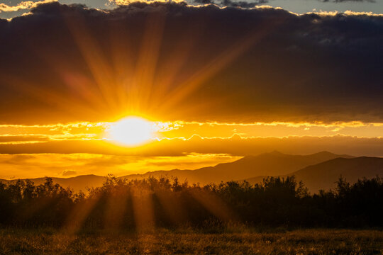 God rays over landscape at sunset