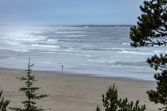 Distant lone person on Agate Beach