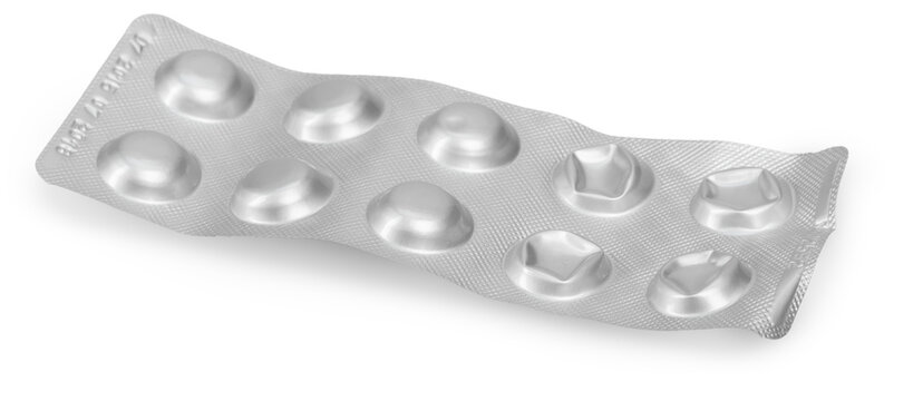Empty blister pack with several capsules remaining from a medication in a clean setting