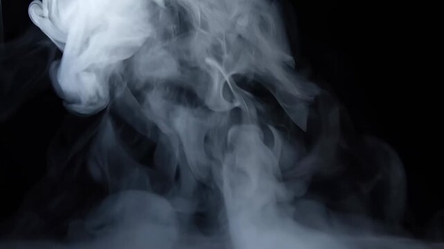 White smoke curls and diffuses through a dark atmospheric space. Cinematic title, dramatic transitions, and film compositing.