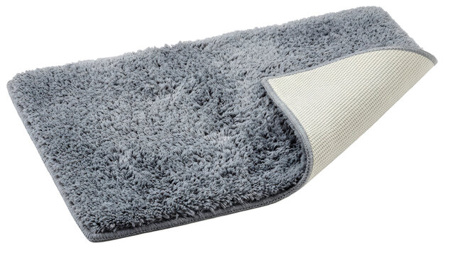 Bath mat, rectangular bathroom mat with plush absorbent pile and textured non-slip backing, photorealistic product photography, three-quarter view, tack-sharp focus, ultra-detailed 8K, on a pure white