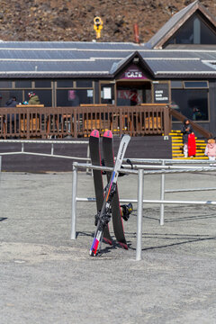 A pair of skis rests outside a mountain cafe at Whakapapa Ski Field on Mount Ruapehu, New Zealand